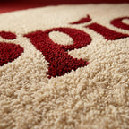 Spicy Chilli Round Tufted Rug | Cream & Red Typography Statement Rug