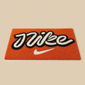 Nike Inspired Script Logo Rug – Orange Minimal Streetwear Tufted Carpet