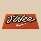 Nike Inspired Script Logo Rug – Orange Minimal Streetwear Tufted Carpet